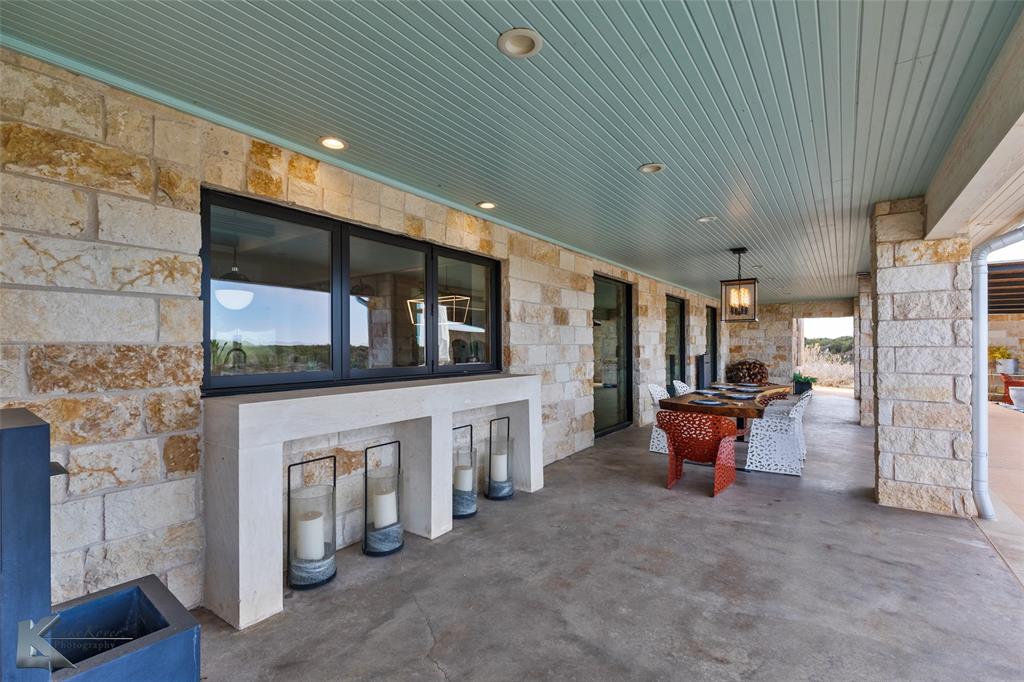 226 Rabbit Run Tuscola, TX 79562 - Photo 28 of 40 a large room with pool table and sofas