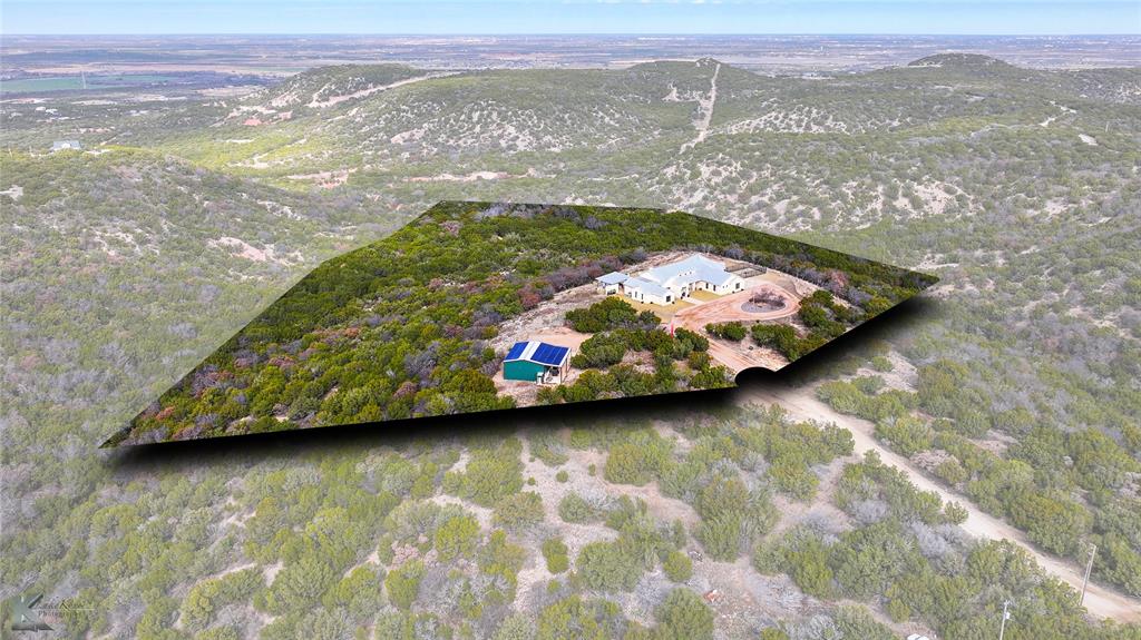 226 Rabbit Run Tuscola, TX 79562 - Photo 36 of 40 a view of a lake with a mountain