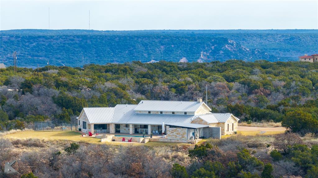 226 Rabbit Run Tuscola, TX 79562 - Photo 37 of 40 an aerial view of a house with a garden and lake view