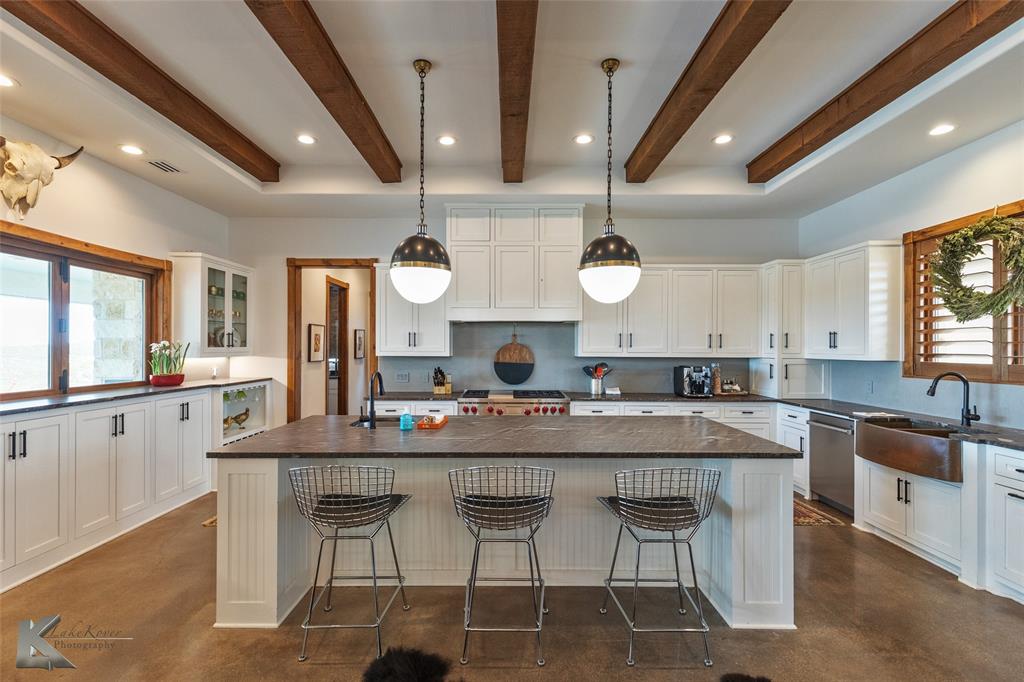 226 Rabbit Run Tuscola, TX 79562 - Photo 9 of 40 a large kitchen with a table and chairs