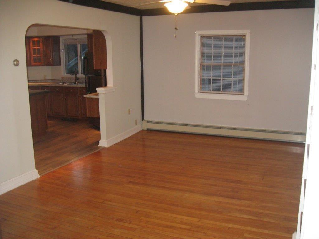 7 Harris Street Springvale, ME 04083 - Photo 6 of 24 Living room w/ hardwood flooring