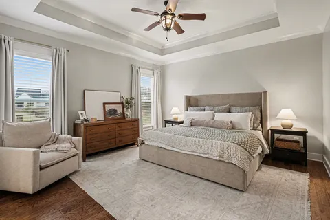 a bedroom with a bed and furniture