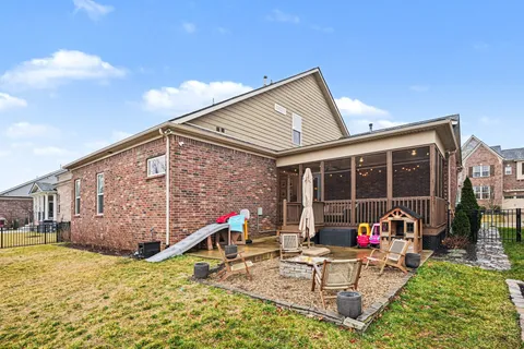 a view of a patio with a yard