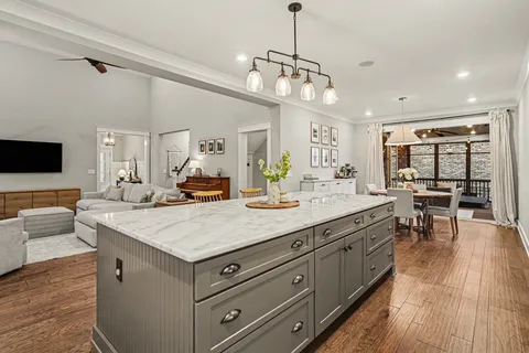 a view of living room with granite countertop furniture and fireplace