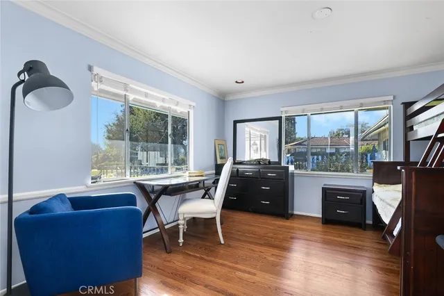 a dining room with furniture window wooden floor