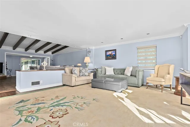 a living room with furniture and a couch