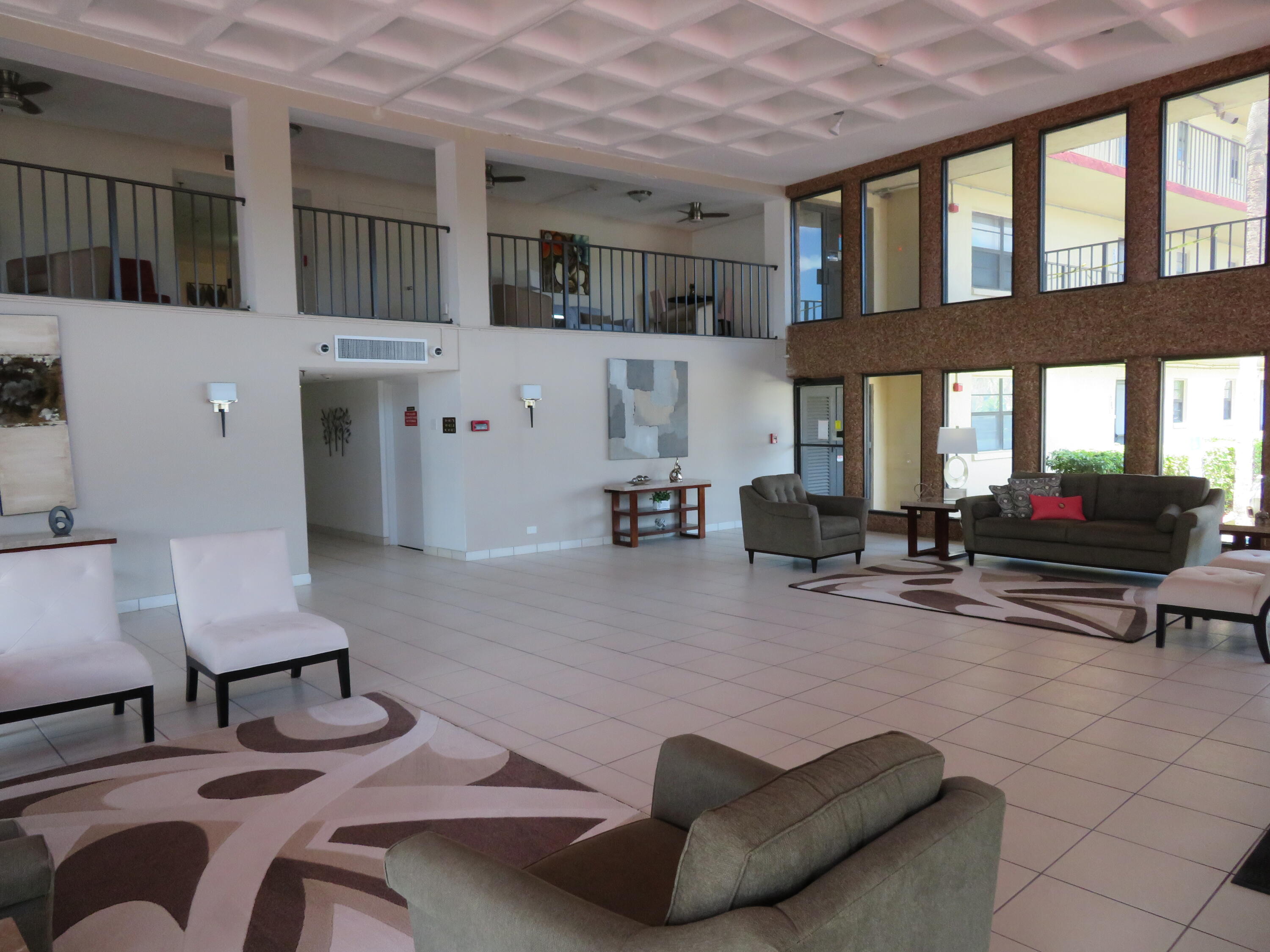 9233 Southwest 8th Street, Unit 409 Boca Raton, FL 33428 - Photo 8 of 40 5.5 9233 Bldg. Lobby