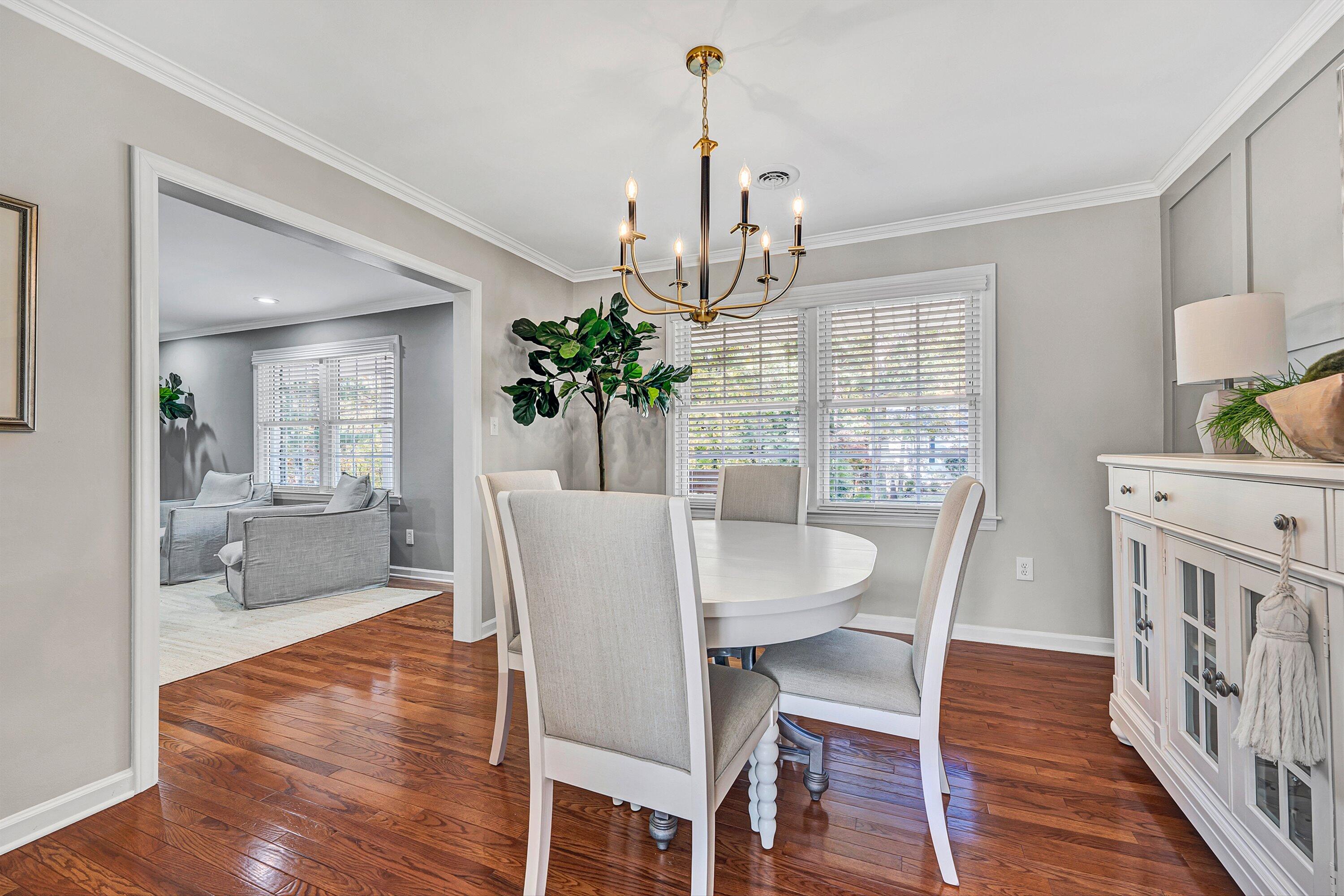 5063 Falcon Ridge Road Roanoke, VA 24018 - Photo 14 of 82 a view of a dining room with furniture wooden floor and chandelier