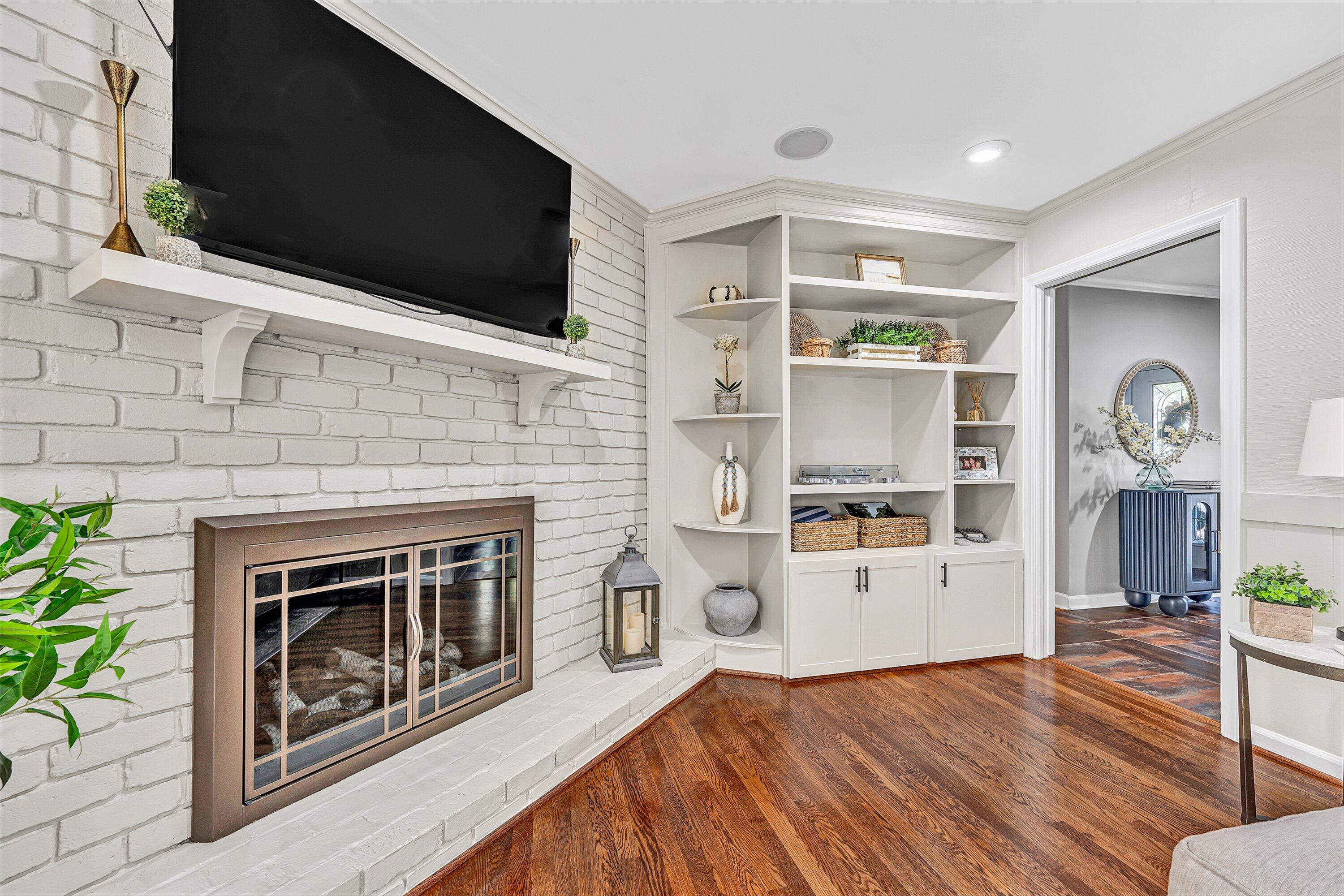 5063 Falcon Ridge Road Roanoke, VA 24018 - Photo 19 of 82 a living room with stainless steel appliances furniture a fireplace and a flat screen tv