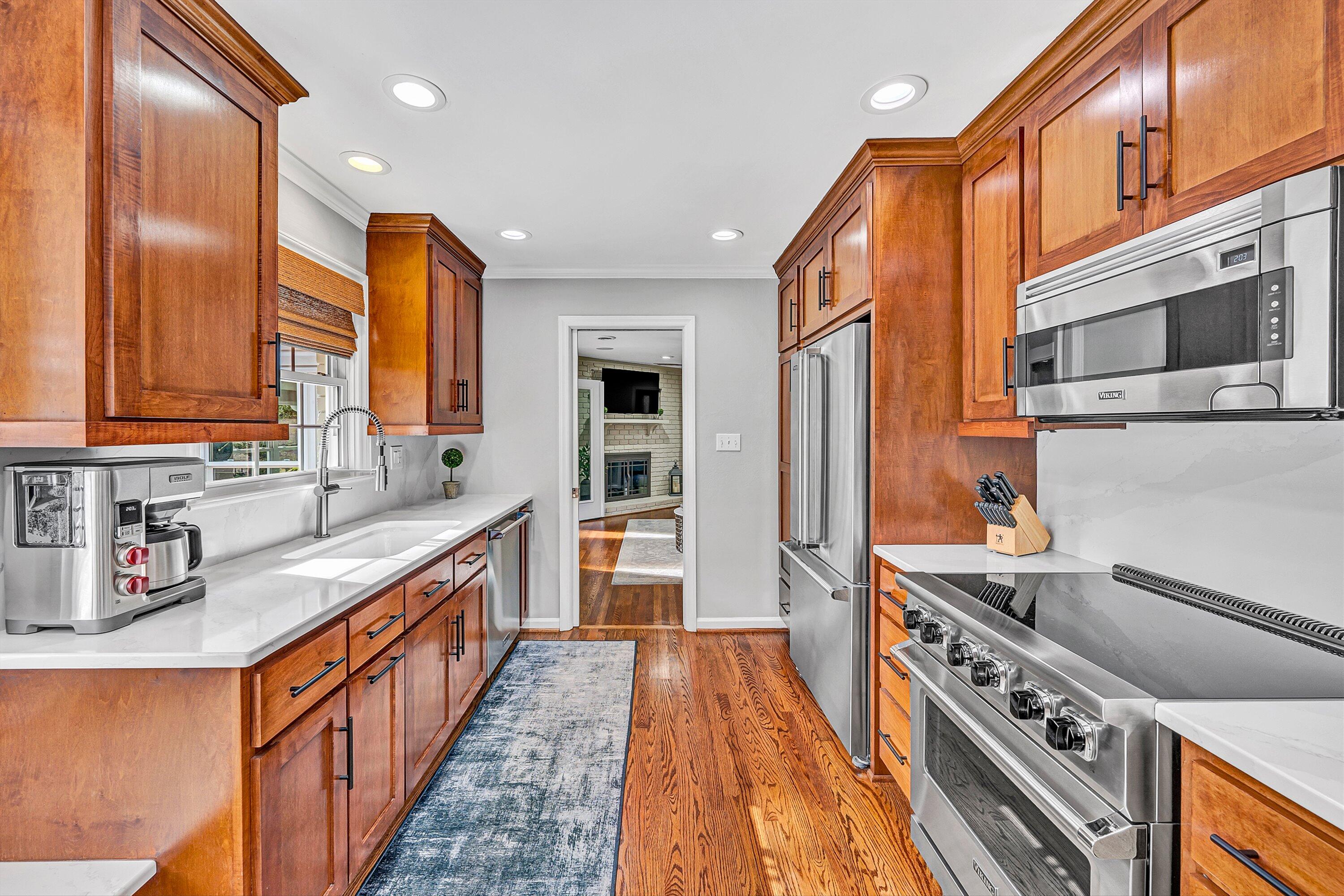 5063 Falcon Ridge Road Roanoke, VA 24018 - Photo 29 of 82 a kitchen with stainless steel appliances granite countertop a stove and a sink