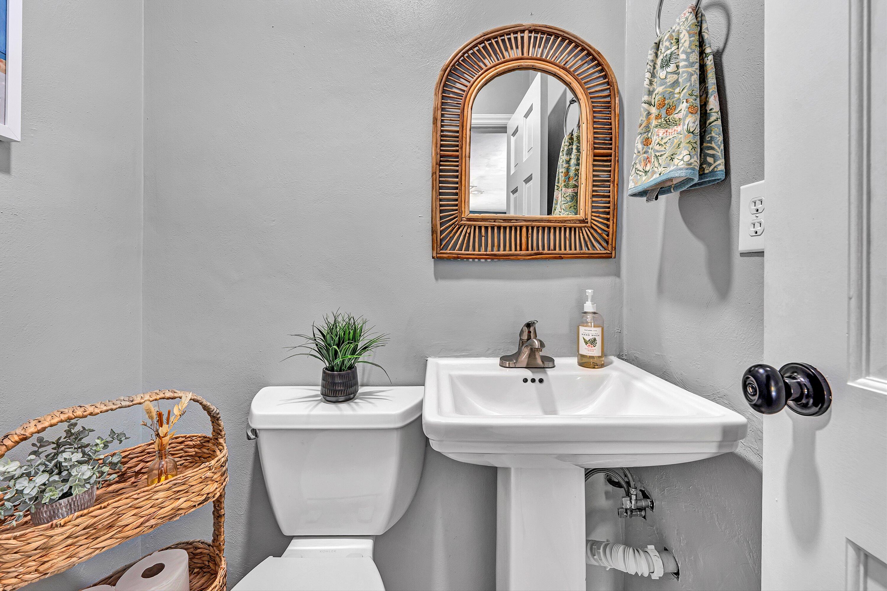 5063 Falcon Ridge Road Roanoke, VA 24018 - Photo 33 of 82 a bathroom with a sink a mirror and a toilet