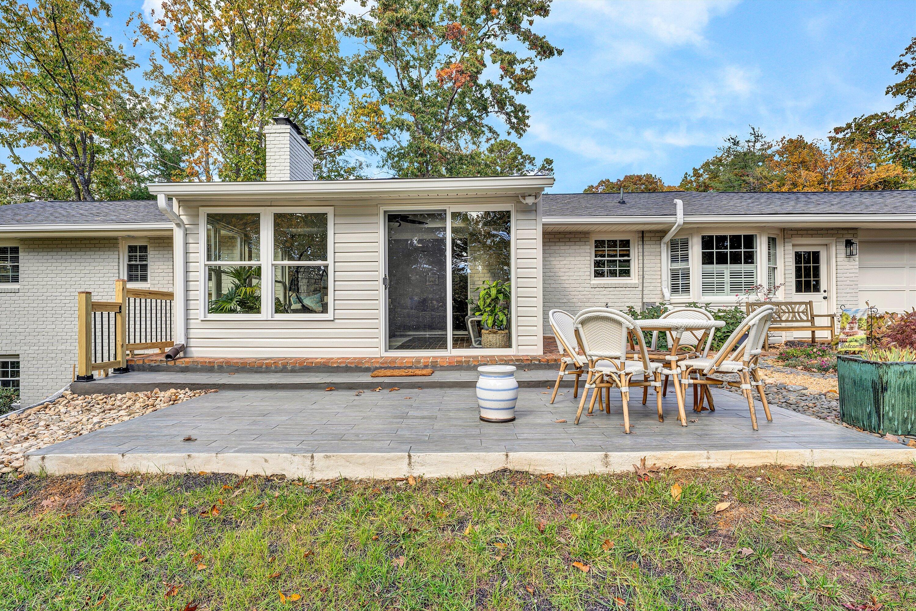 5063 Falcon Ridge Road Roanoke, VA 24018 - Photo 64 of 82 a view of a house with backyard sitting area and garden