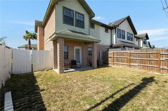 a house view with a garden space