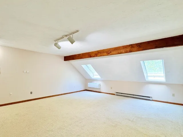 a view of a room with an empty space