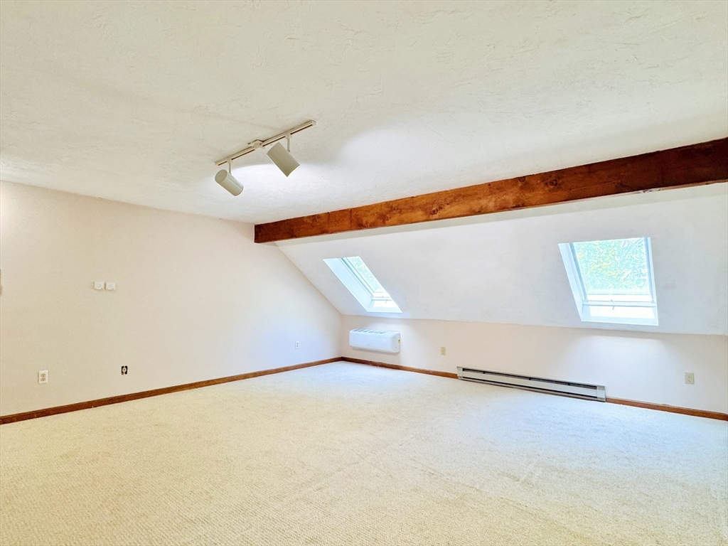 7 Washington Green, Unit 7 Walpole, MA 02032 - Photo 14 of 23 a view of a room with an empty space