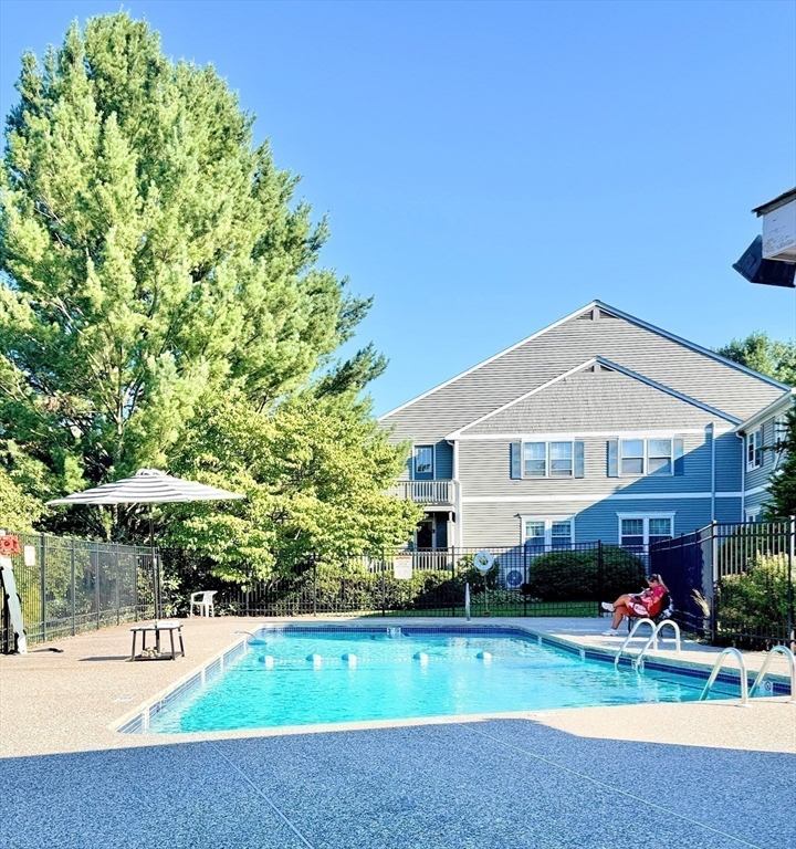 7 Washington Green, Unit 7 Walpole, MA 02032 - Photo 22 of 23 a house view with a outdoor space
