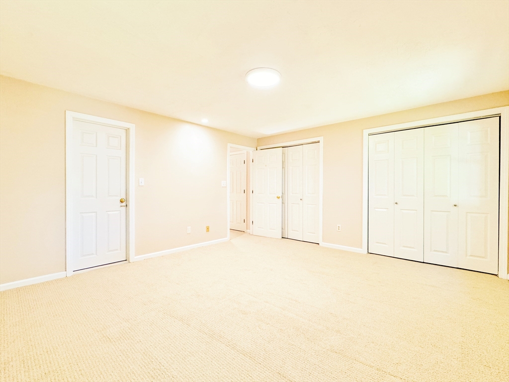 7 Washington Green, Unit 7 Walpole, MA 02032 - Photo 8 of 23 an empty room with a empty space