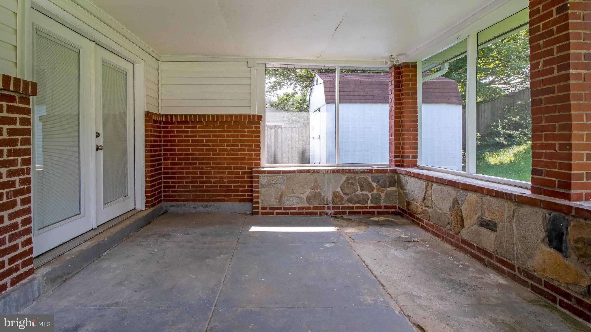 2603 Burridge Road Baltimore, MD 21234 - Photo 22 of 26 Oversized screened patio with double door entry