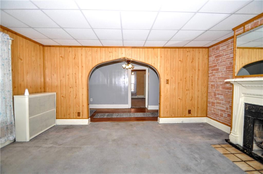509 West Main Street Monongahela, PA 15063 - Photo 11 of 39 a view of an empty room with a fireplace