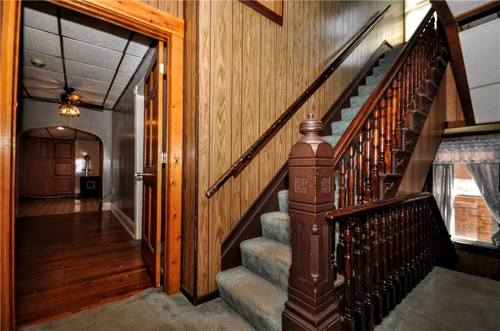 509 West Main Street Monongahela, PA 15063 - Photo 29 of 39 a view of staircase with wooden floor and white walls