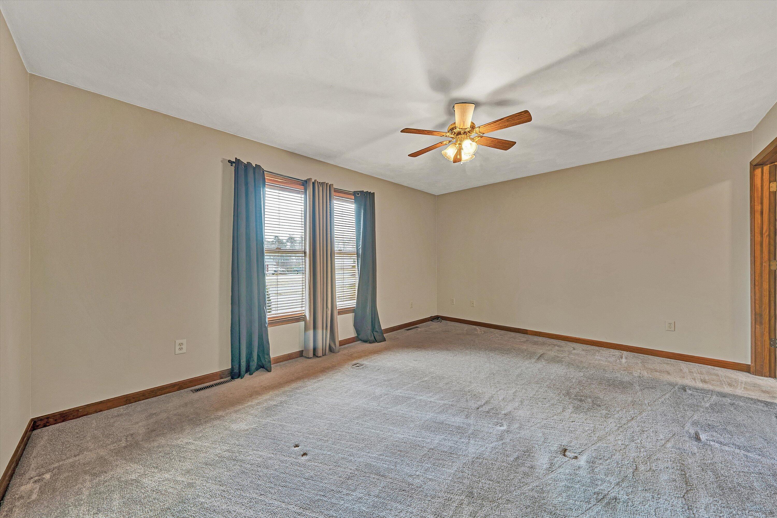 460 Stonybrook Road Wirtz, VA 24184 - Photo 17 of 44 a view of an empty room with a window