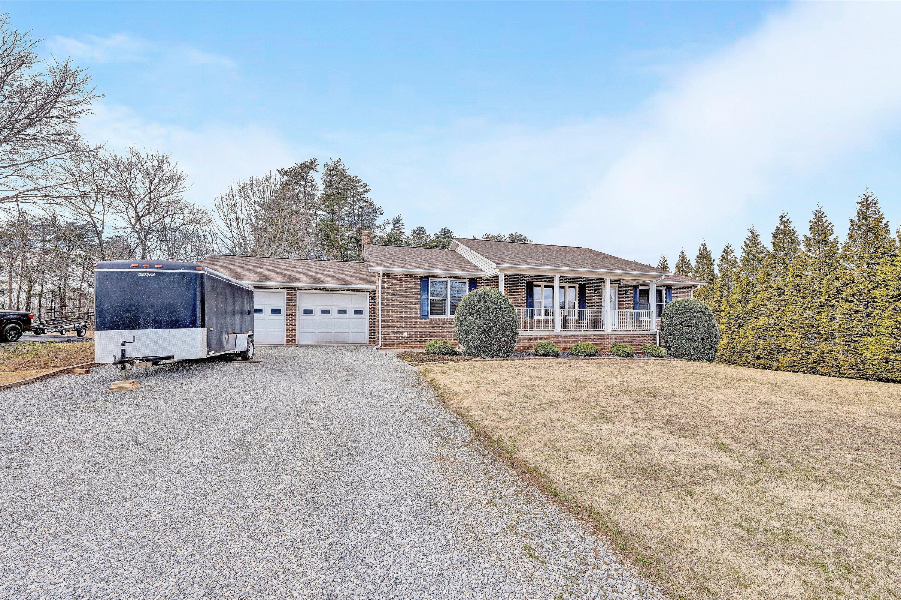 460 Stonybrook Road Wirtz, VA 24184 - Photo 2 of 44 a view of house with outdoor space and sitting area