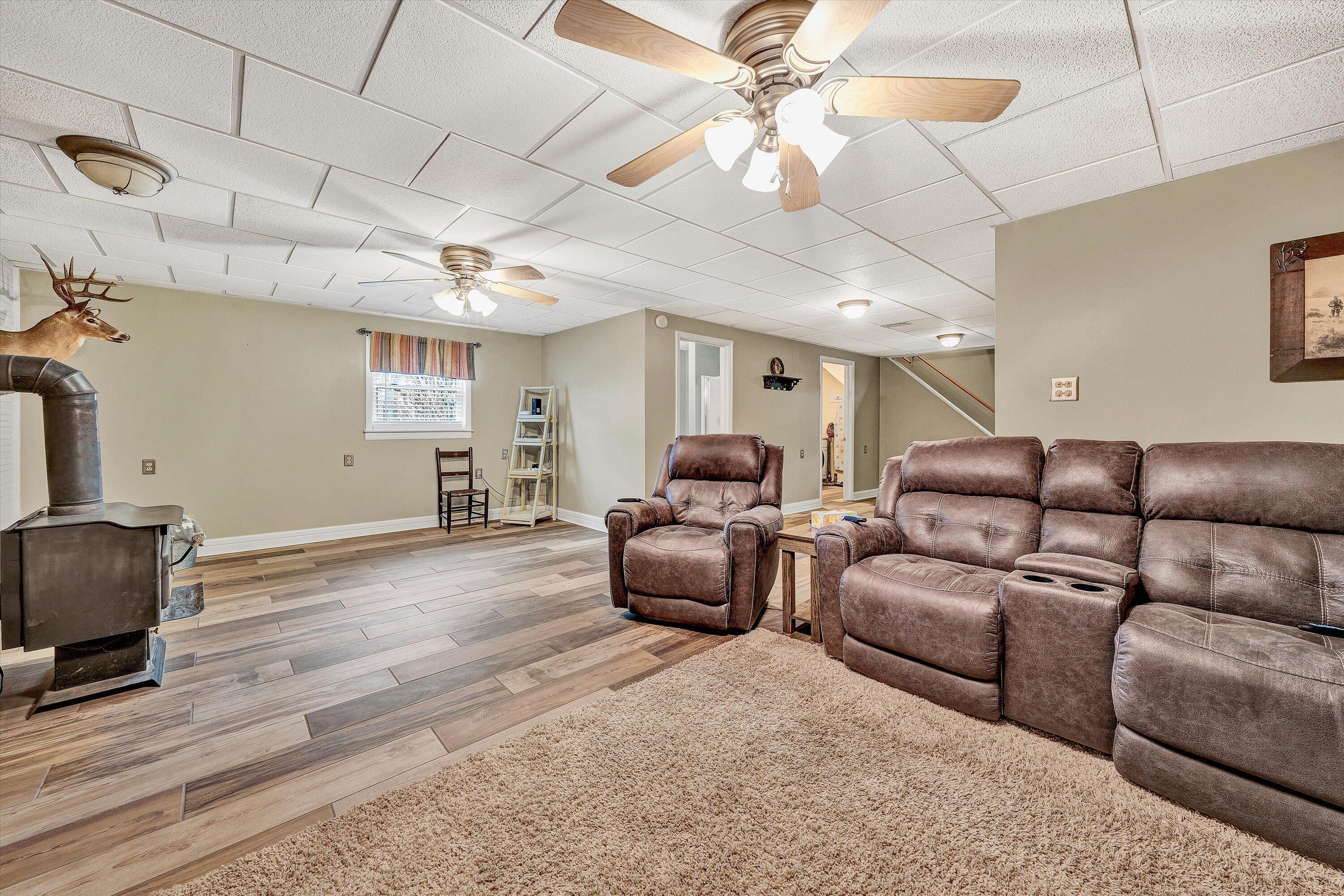 460 Stonybrook Road Wirtz, VA 24184 - Photo 28 of 44 a living room with furniture and a wooden floor
