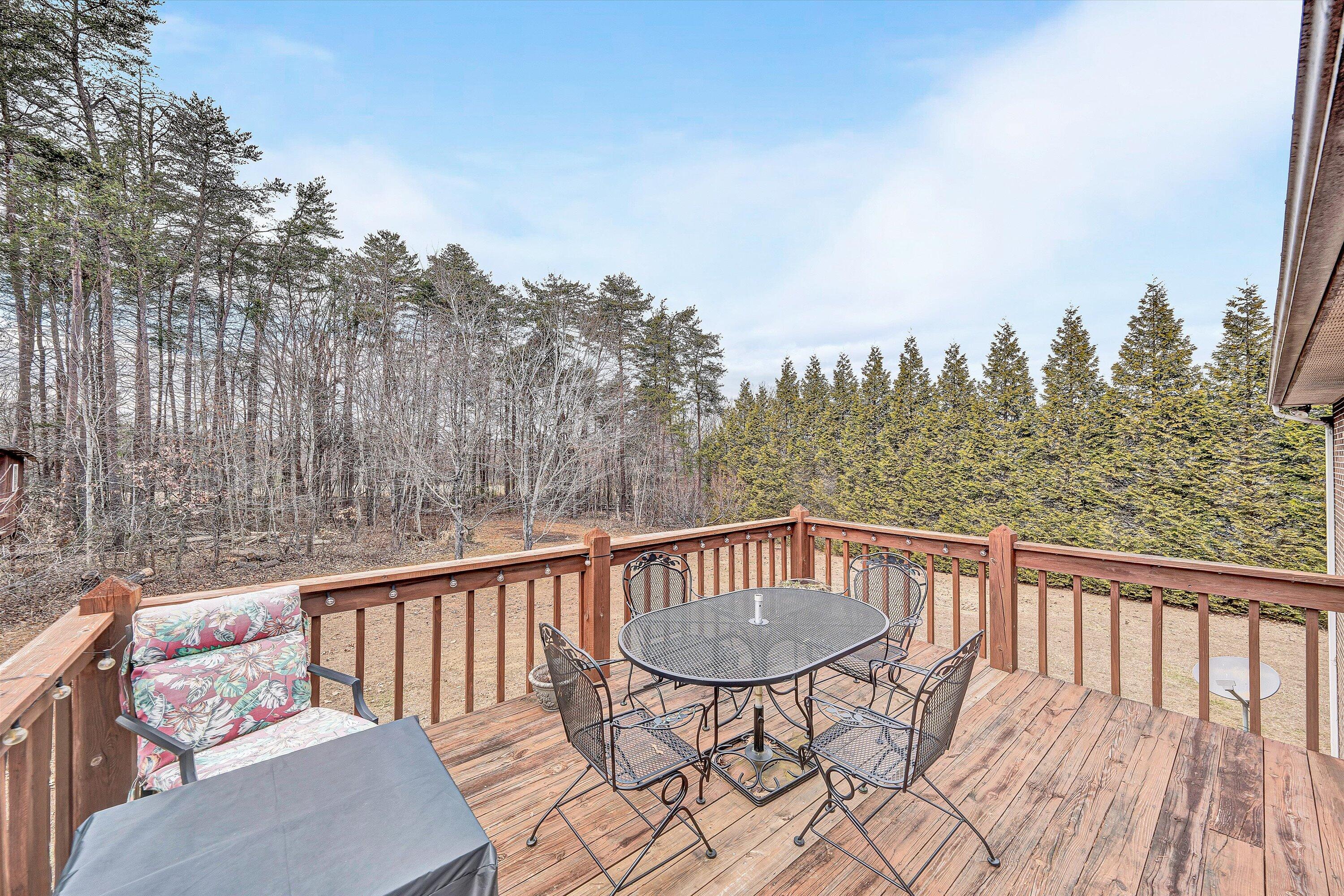 460 Stonybrook Road Wirtz, VA 24184 - Photo 36 of 44 a view of a balcony with mountain view and wooden floor