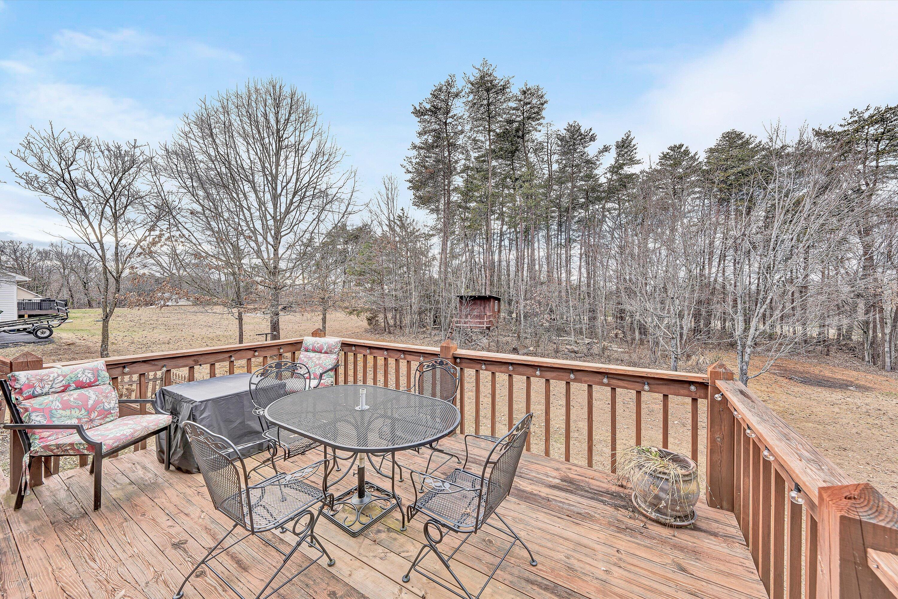 460 Stonybrook Road Wirtz, VA 24184 - Photo 37 of 44 a view of balcony with wooden floor and outdoor seating