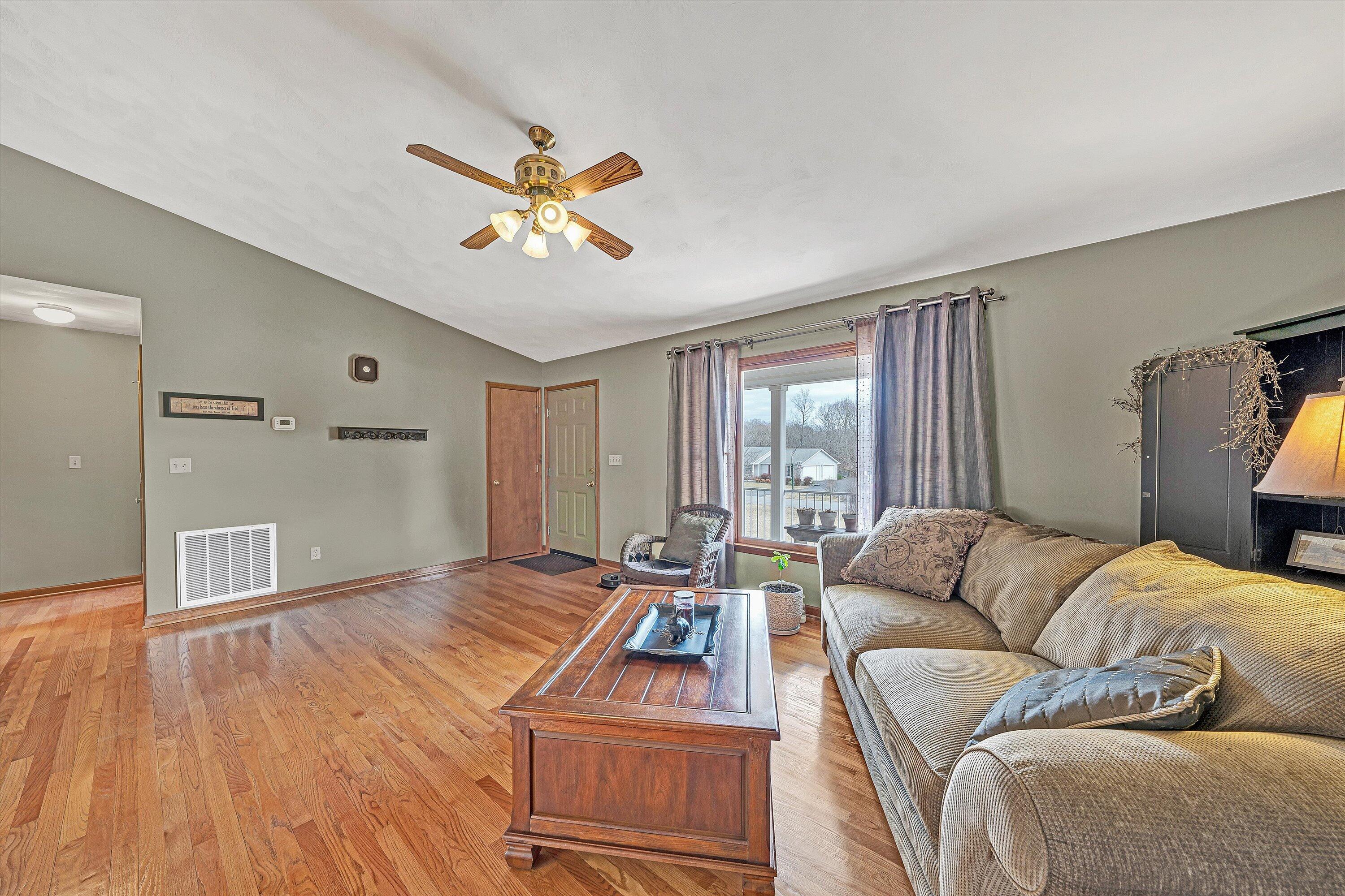 460 Stonybrook Road Wirtz, VA 24184 - Photo 8 of 44 a living room with furniture and a window