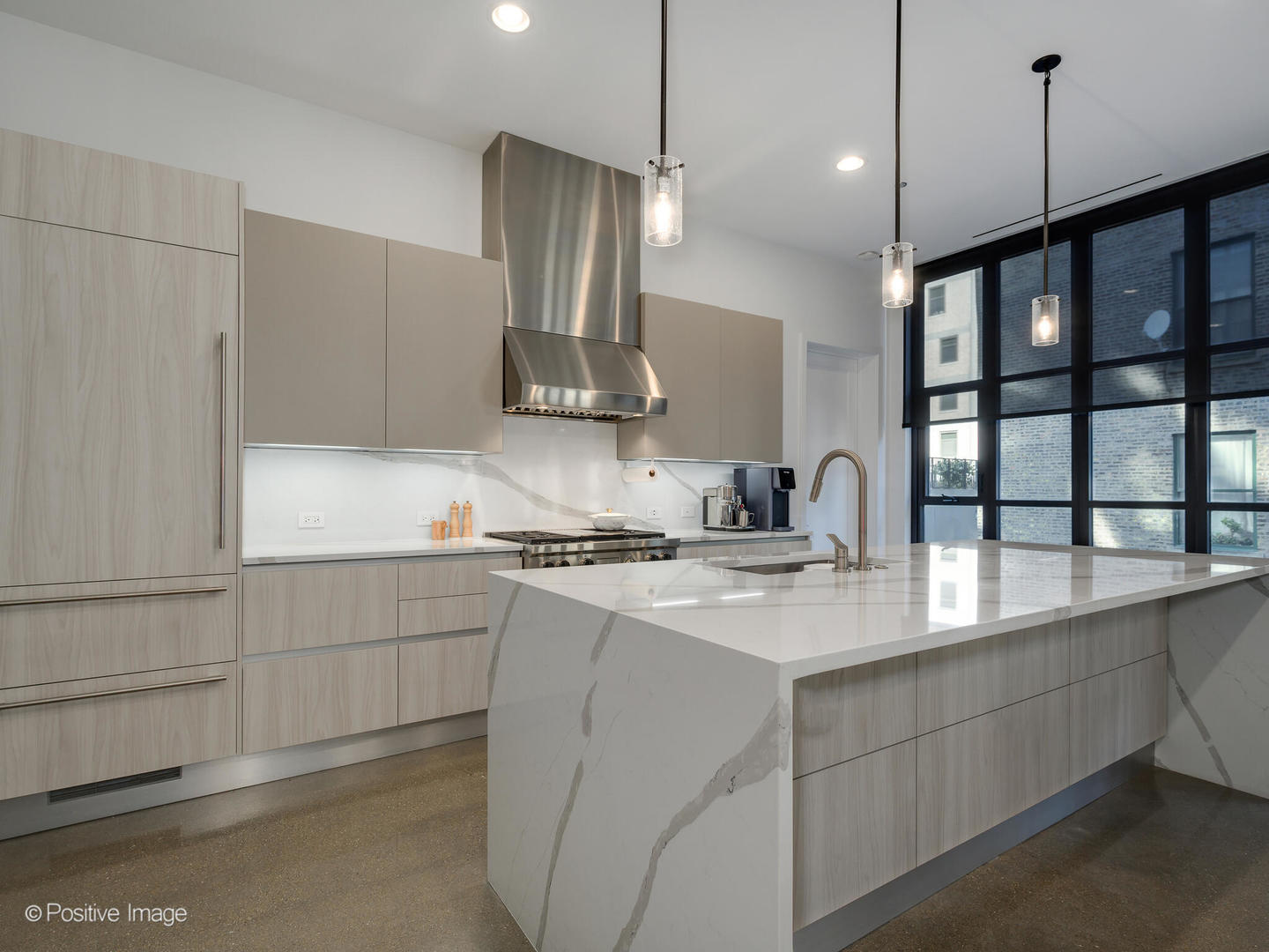 Undisclosed Address Chicago, IL 60607 - Photo 5 of 18 a kitchen with stainless steel appliances granite countertop a sink a stove and a refrigerator