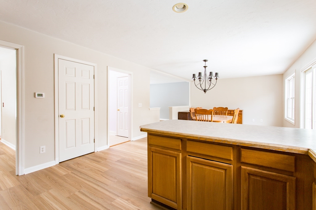 270 New Braintree Road West Brookfield, MA 01585 - Photo 11 of 37 a hallway with cabinet and wooden floor