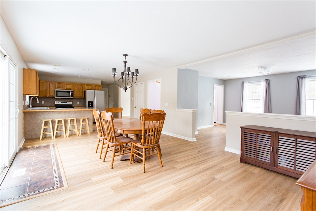 270 New Braintree Road West Brookfield, MA 01585 - Photo 13 of 37 a view of a dining room with furniture and wooden floor