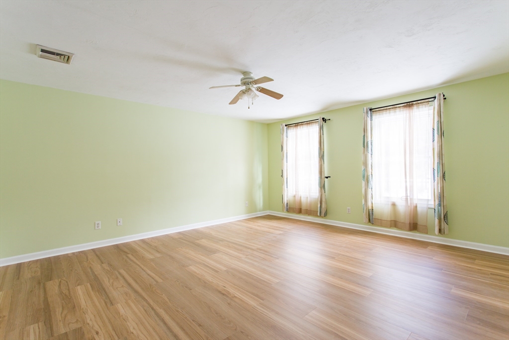 270 New Braintree Road West Brookfield, MA 01585 - Photo 23 of 37 an empty room with wooden floor and windows