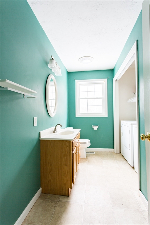 270 New Braintree Road West Brookfield, MA 01585 - Photo 33 of 37 a view of a bathroom with a sink and a mirror