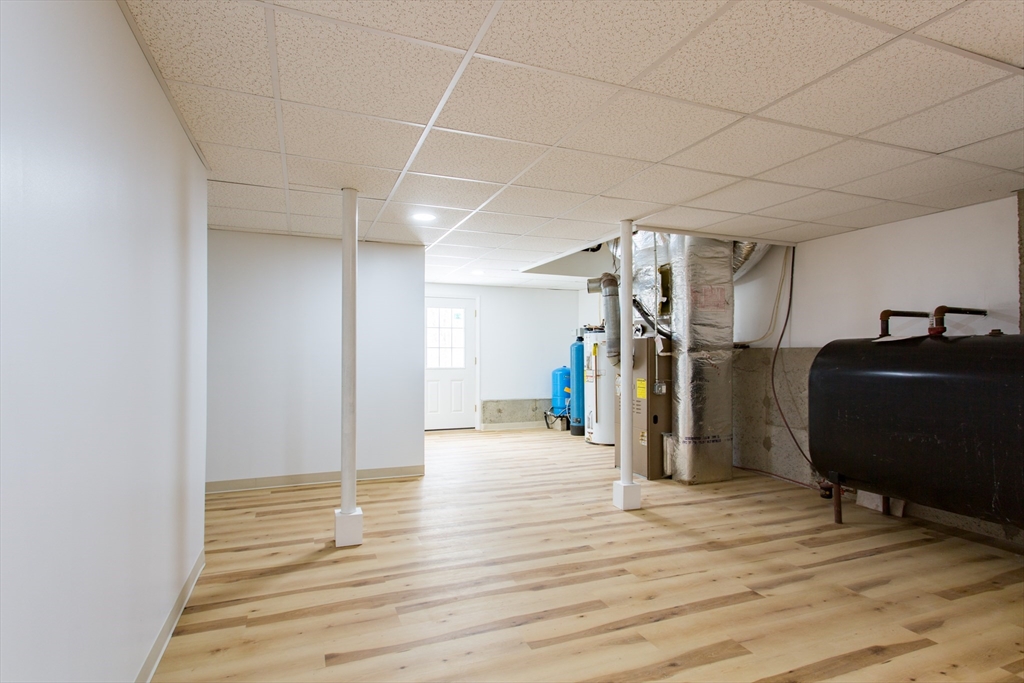 270 New Braintree Road West Brookfield, MA 01585 - Photo 35 of 37 a view of a livingroom with wooden floor and chair