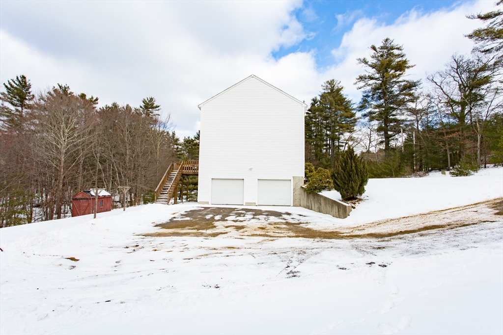 270 New Braintree Road West Brookfield, MA 01585 - Photo 4 of 37 a view of a house with snow on the background