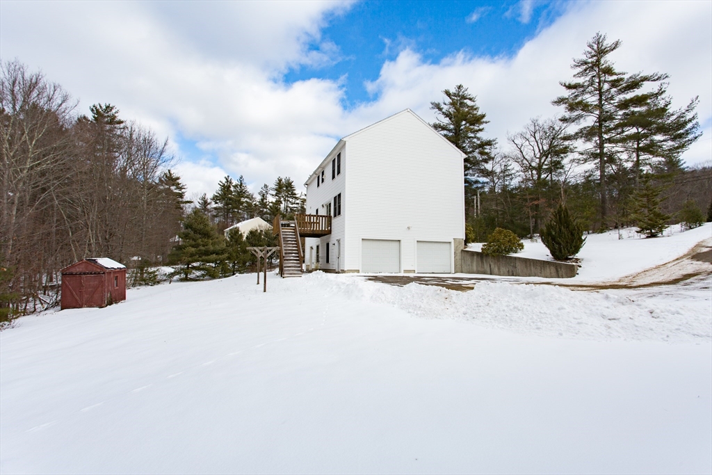 270 New Braintree Road West Brookfield, MA 01585 - Photo 5 of 37 a view of a terrace with a snow on the road