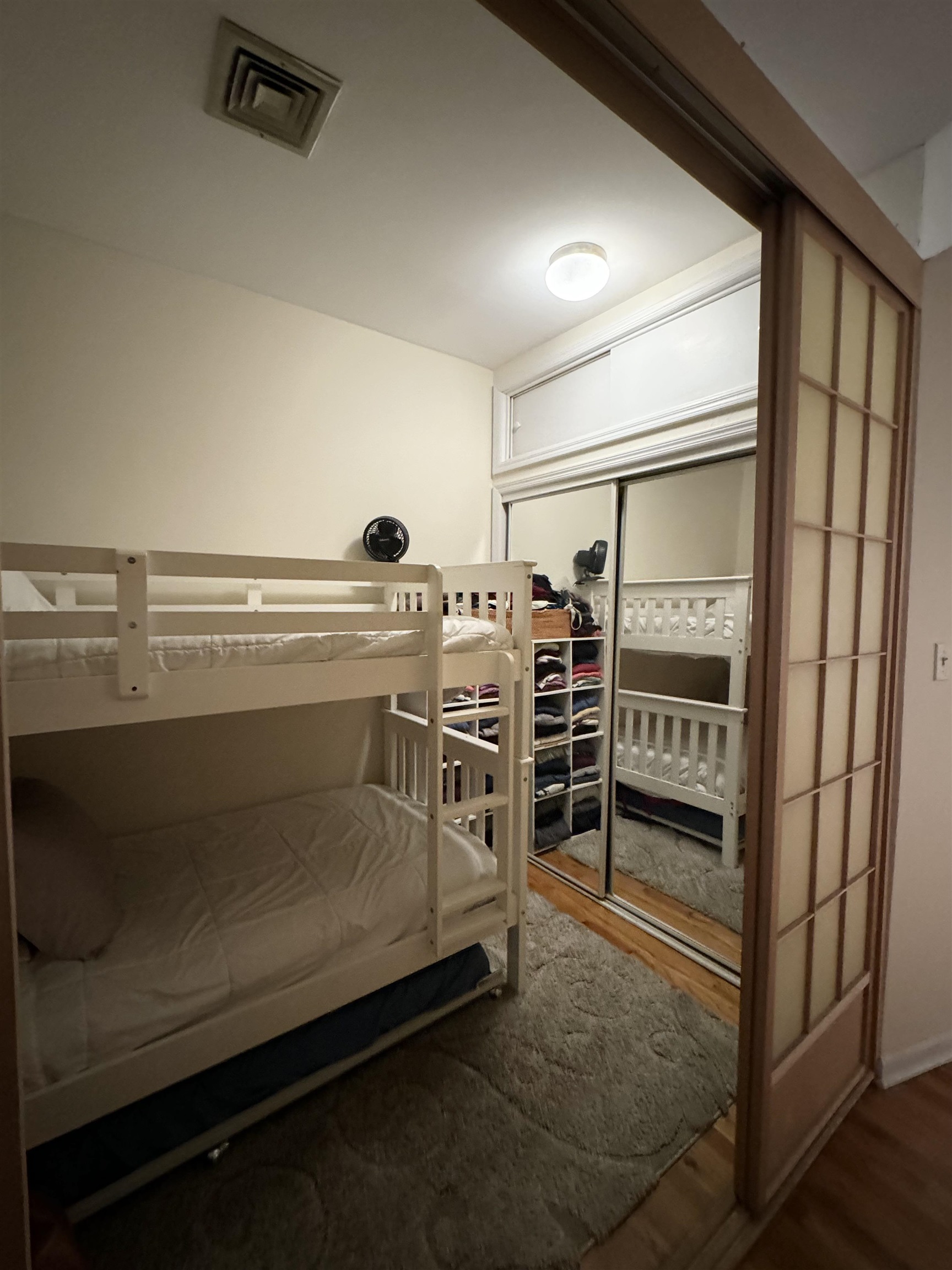 155 14th Street, Unit 2L Hoboken, NJ 07030 - Photo 7 of 13 a view of a room with racks