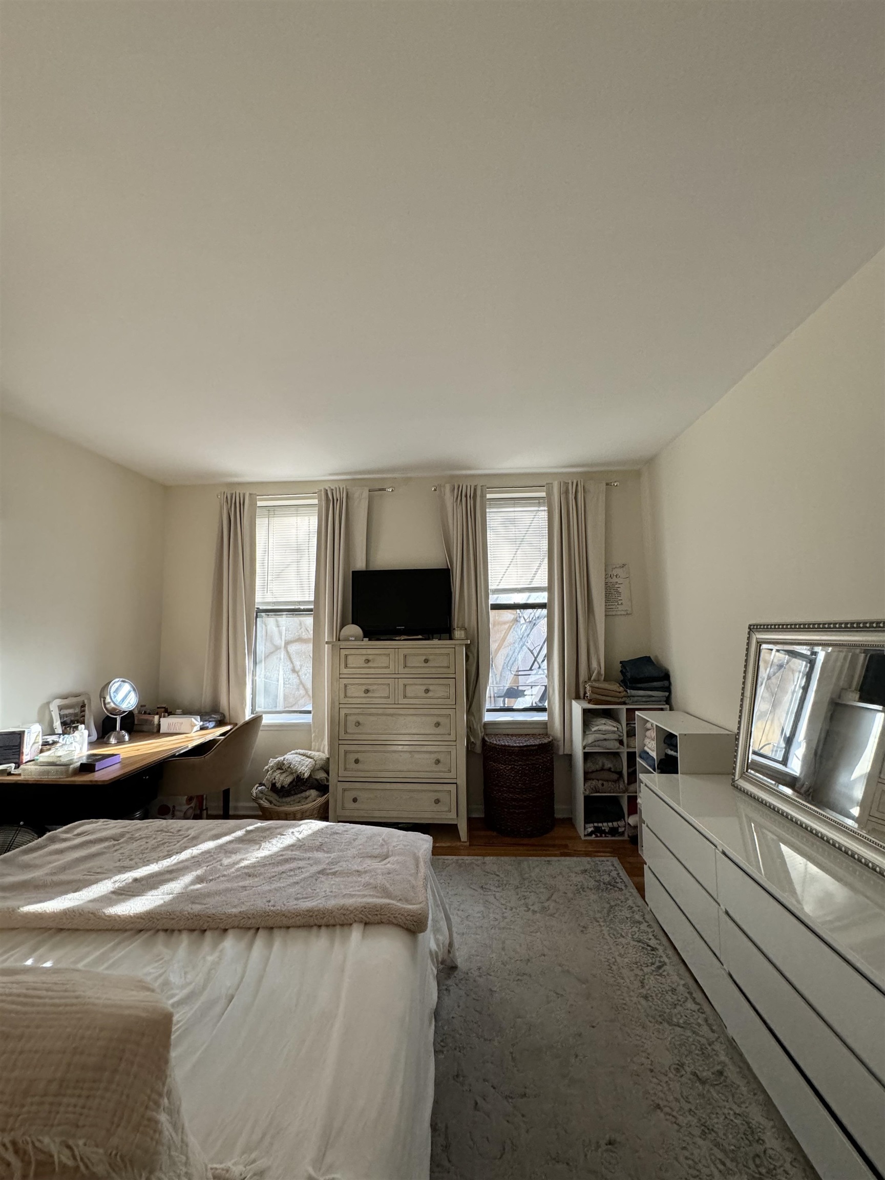 155 14th Street, Unit 2L Hoboken, NJ 07030 - Photo 10 of 13 a bedroom with furniture or couch and a window