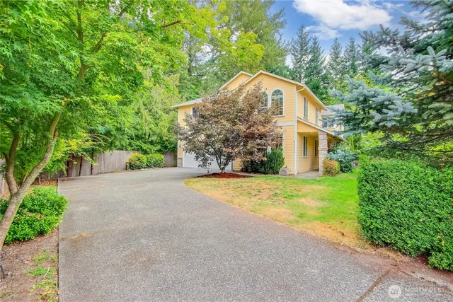 a house with trees in front of it