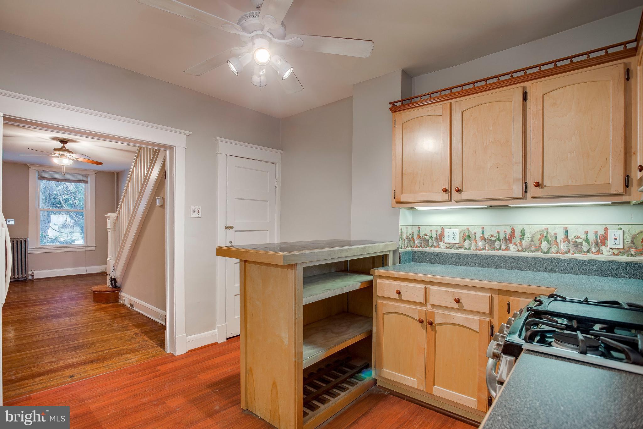 1130 Roland Heights Avenue Baltimore, MD 21211 - Photo 14 of 27 Kitchen has a removable bar counter/cabinet