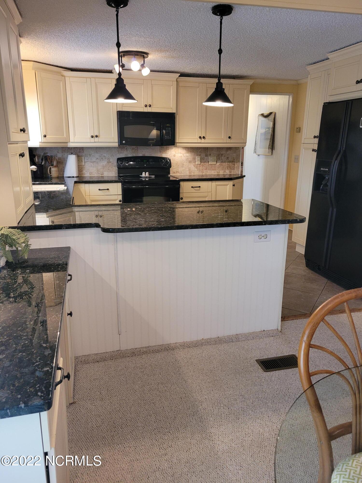 405 Alabama Avenue Carolina Beach, NC 28428 - Photo 10 of 40 20220927_154525