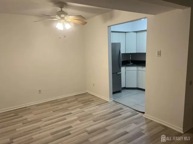 an empty room with a bathroom