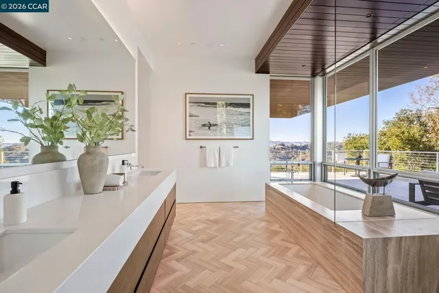 a view of a patio with a table and chairs