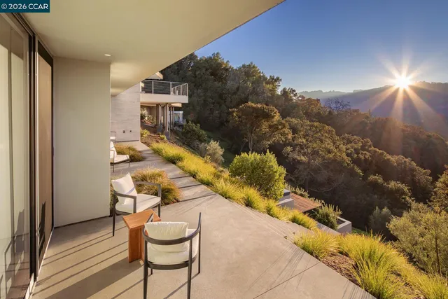 a bathroom with a sink a vanity and a mirror