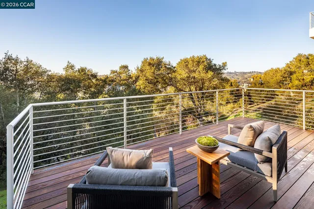 a view of a swimming pool with a deck