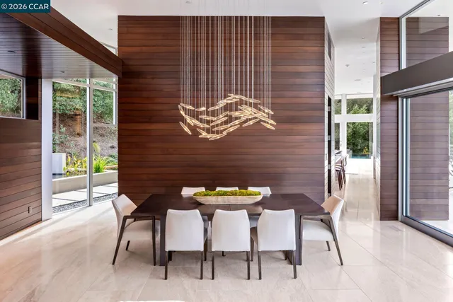 a kitchen with stove a sink and cabinets