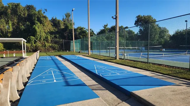 a view of swimming pool with a back yard