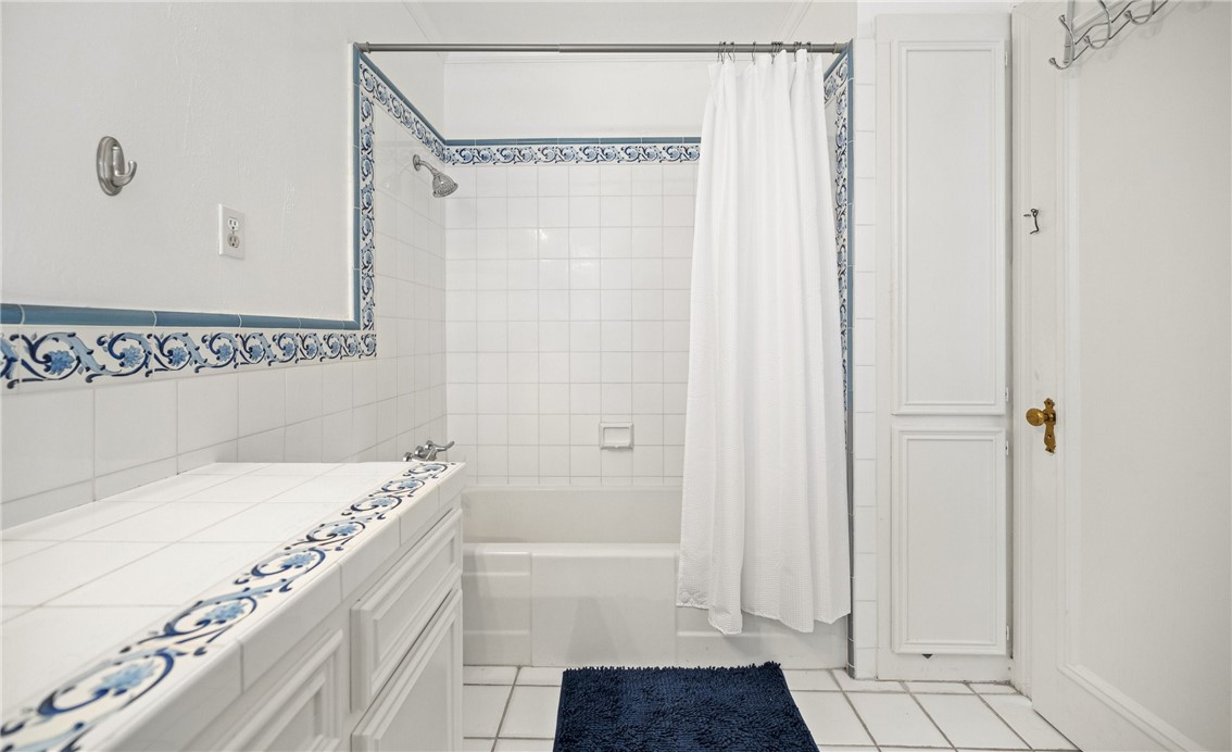 245 Leming Avenue Corpus Christi, TX 78404 - Photo 25 of 33 a bathroom with a bathtub and a shower